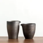 vintage gilded ceramic gong dao bei tea pitcher main product view