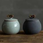 main view of vintage green ceramic airtight tea jar