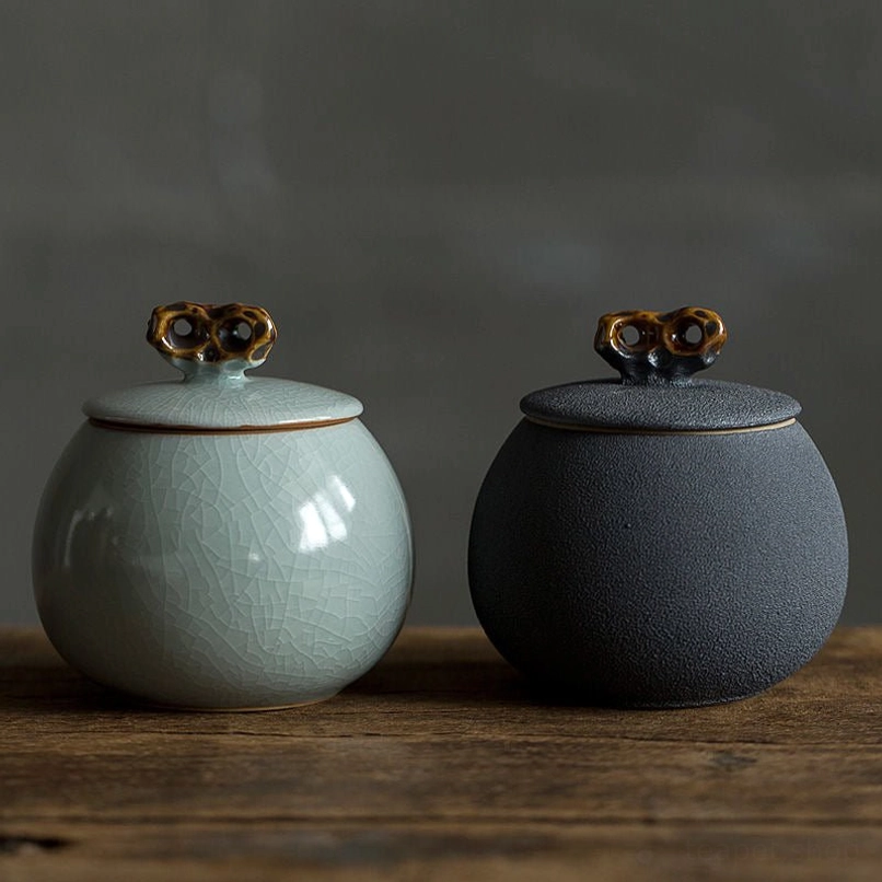 main view of vintage green ceramic airtight tea jar