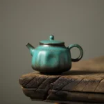 front view of 150ml vintage green speckled ceramic teapot
