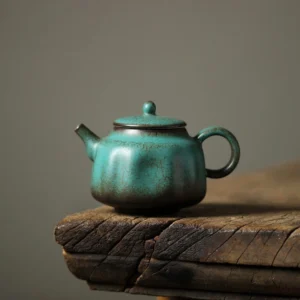 front view of 150ml vintage green speckled ceramic teapot