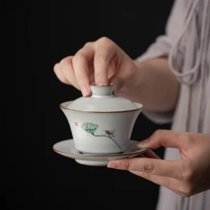 full product shot of vintage hand-painted lotus crackle glaze gaiwan tea set 160ml