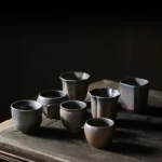 full set of vintage rustic ceramic chinese kung fu tea cups with multiple shapes
