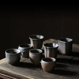 full set of vintage rustic ceramic chinese kung fu tea cups with multiple shapes