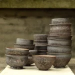 Collection of vintage rustic Chinese clay tea cups for gongfu tea