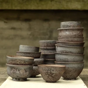 Collection of vintage rustic Chinese clay tea cups for gongfu tea