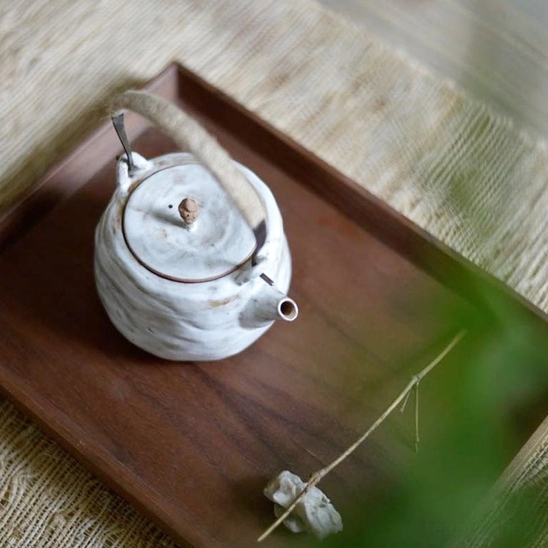 built-in tea strainer inside wabi-sabi ceramic tea pot