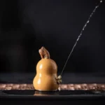 handcrafted water-spraying gourd frog tea pet good fortune symbol front view