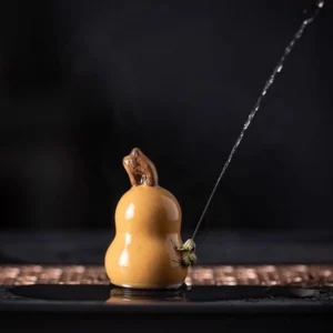 handcrafted water-spraying gourd frog tea pet good fortune symbol front view