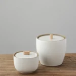 Full collection of white ceramic tea jar with wood handle in two sizes