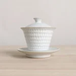 front view of 160ml white porcelain gaiwan tea set with gold trim