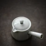 Overall view of complete 150ml white ceramic kyusu teapot set with teacups, tea tray, and tea canister