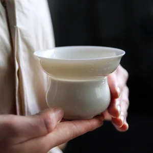 full view of handcrafted white porcelain loose leaf tea strainer