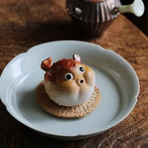 Handcrafted Yixing purple clay cute pufferfish tea pet main front view