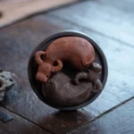 Handcrafted rotatable Yixing purple clay dual water buffalo tea pet with Bagua base