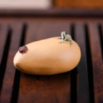 handcrafted yixing purple clay frog beetle tea pet on wooden gongfu tea tray
