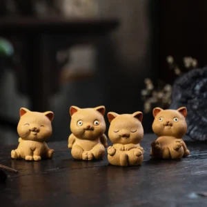 full collection of four cute kitten yixing purple clay tea pets displayed together