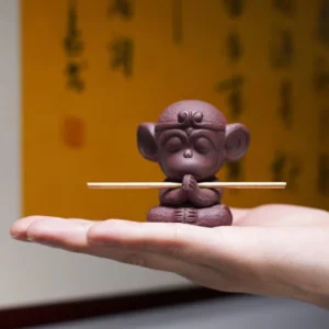 Main view of handcrafted Yixing purple clay meditating Sun Wukong tea pet