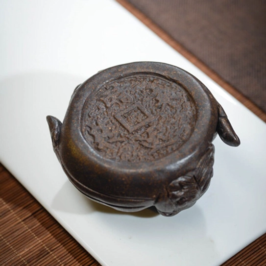 three quarter angled view of handcrafted yixing zisha pixiu tea pet for gongfu cha