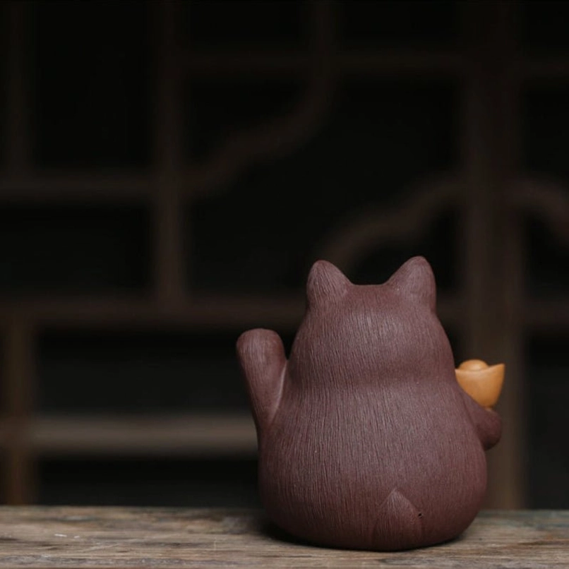 handmade yixing zisha lucky cat tea pet front view warm yellow