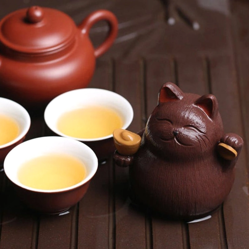 yixing zisha lucky cat tea pet placement on wooden tea table