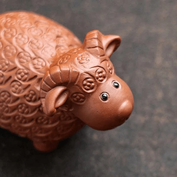 handmade yixing zisha money sheep tea pet back view with coin patterns